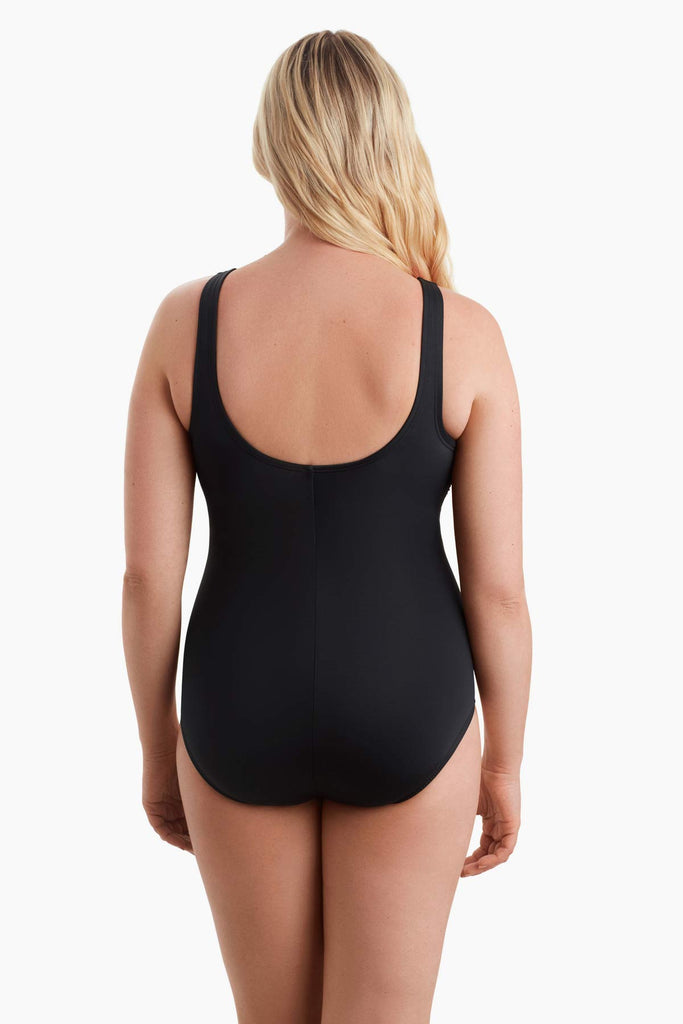 Woman faced away to show back of swimsuit