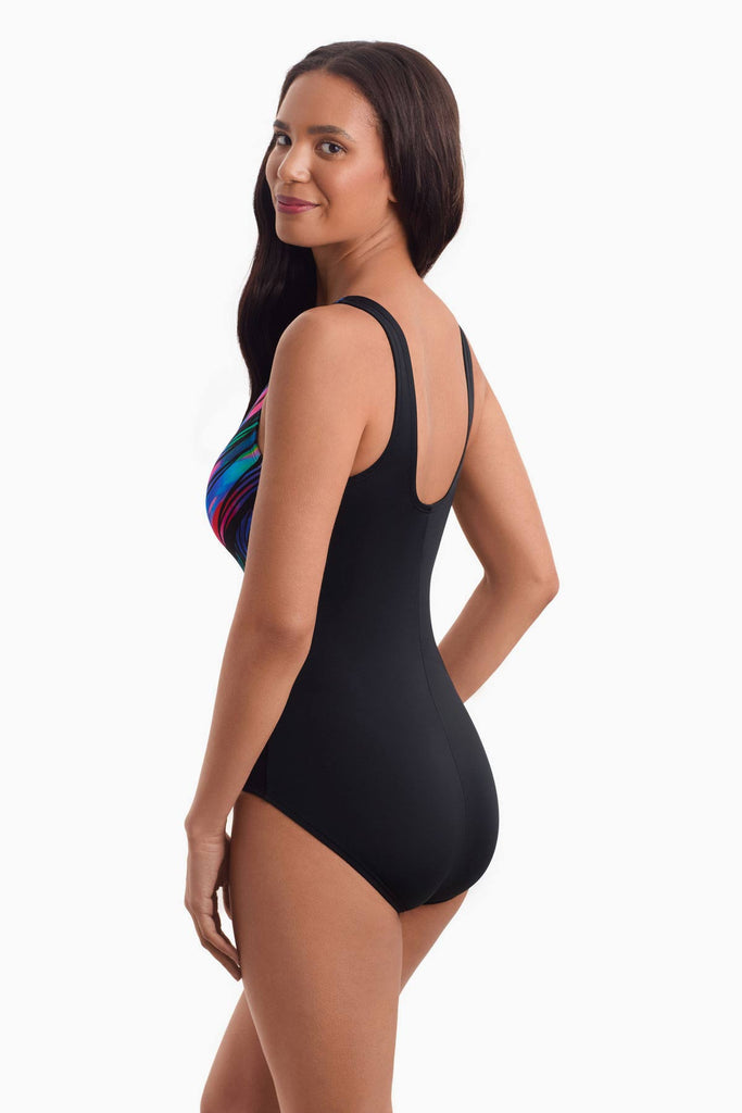 Woman facing left to show off detail of one-piece swimsuit