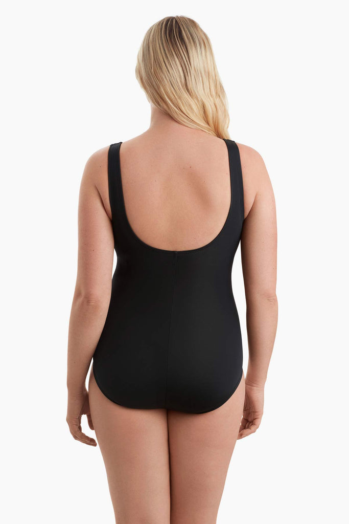 Woman faced away show off scoop back of swimsuit