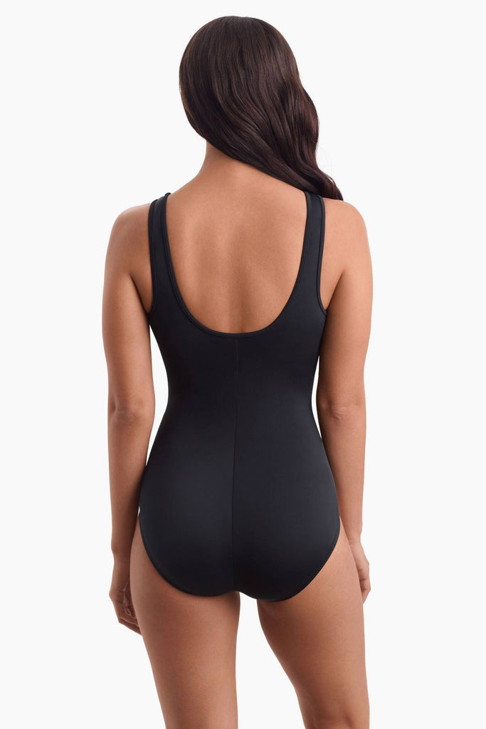 Woman facing away to show off back of swimsuit