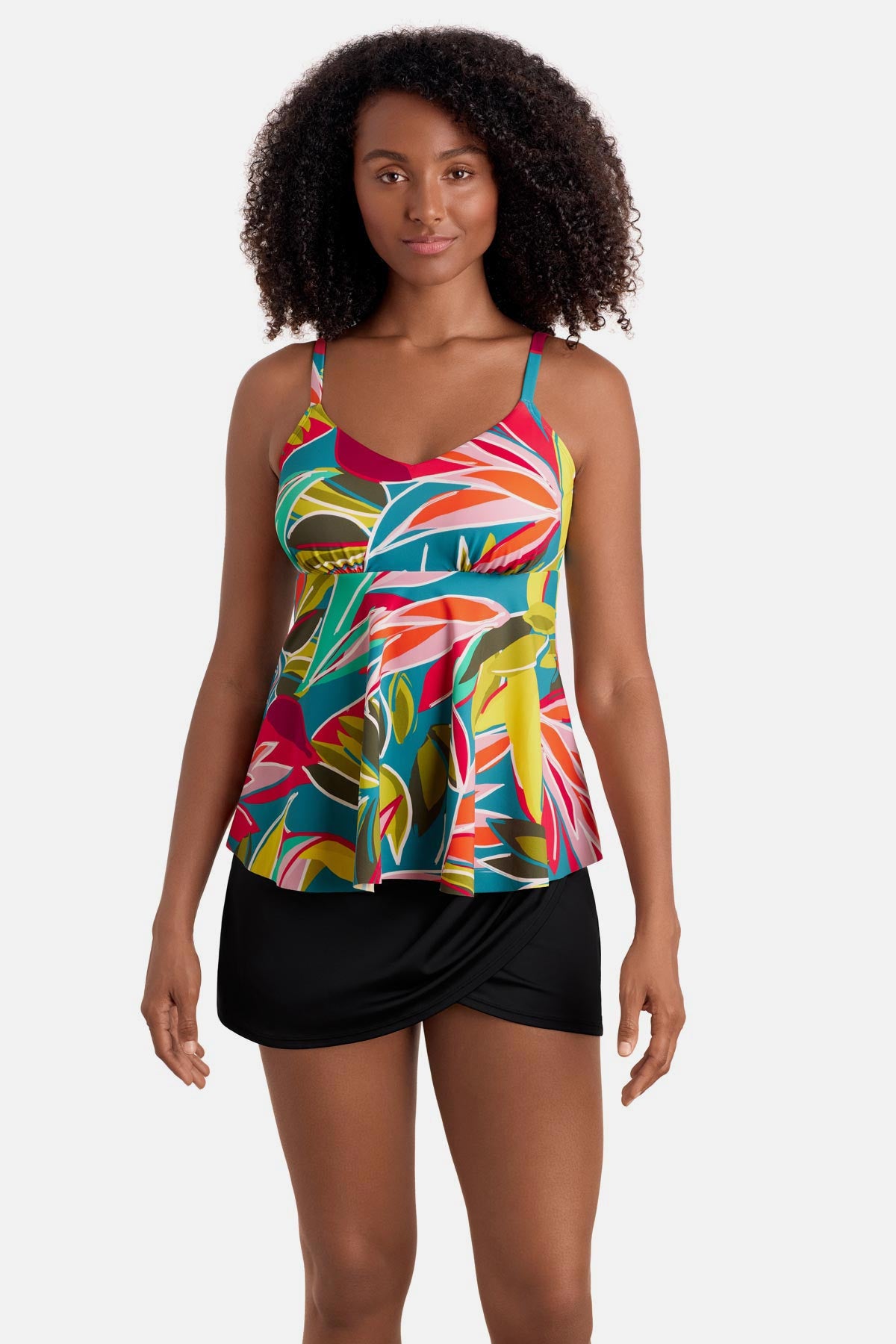 Woman wearing a multicolored abstract printed tankini top